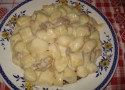 Gnocchi con fonduta di groviera noci e salsicce